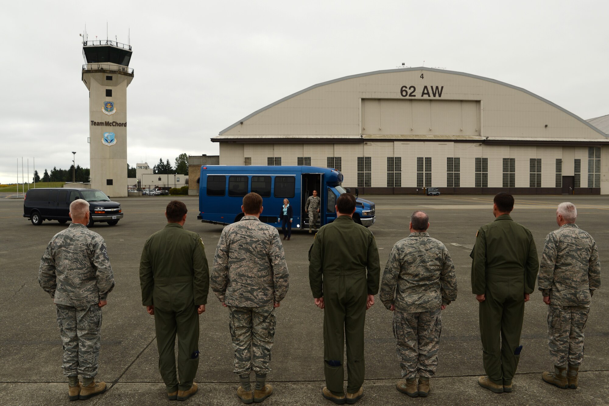 Senior leadership from the 62nd and 446th Airlift Wings wait to greet Miranda Ballentine, assistant secretary of the Air Force for installations, environment, and energy, May 11, 2015, at Joint Base Lewis-McChord, Wash. Ballentine Received a tour of McChord field along with a static display of a C-17 Globemaster III that featured representatives from several units and missions from McChord Field. (U.S. Air Force photo\ Staff Sgt. Tim Chacon)
