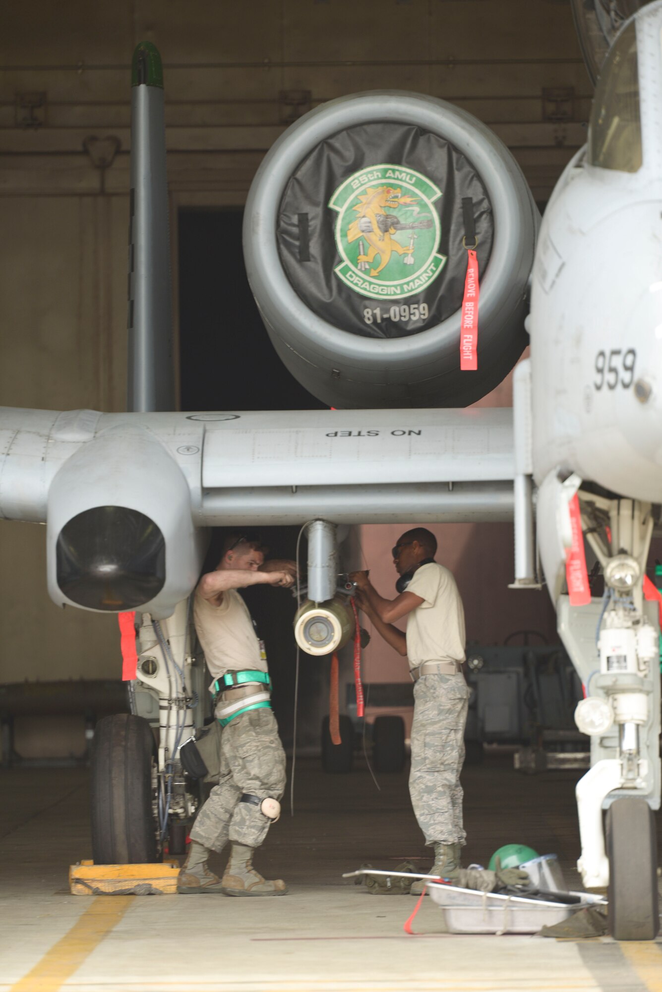 Airmen from the 25th Aircraft Maintenance Unit prepare an A-10 for launch May 6, 2015, at Osan Air Base, Republic of Korea. The planes were launching as part of Beverly Midnight 15-02, an operational readiness exercise designed to test the emergency capabilities of Team Osan. (U.S. Air Force photo by Staff Sgt. Jake Barreiro)