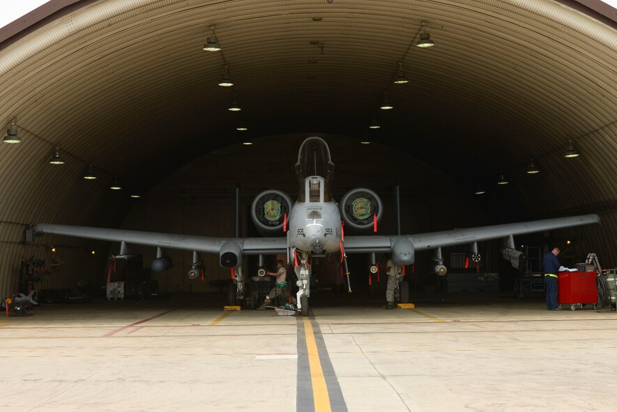 Airmen from the 25th Aircraft Maintenance Unit prepare an A-10 for launch May 6, 2015, at Osan Air Base, Republic of Korea. The planes were launching as part of Beverly Midnight 15-02, an operational readiness exercise designed to test the emergency capabilities of Team Osan. (U.S. Air Force photo by Staff Sgt. Jake Barreiro)