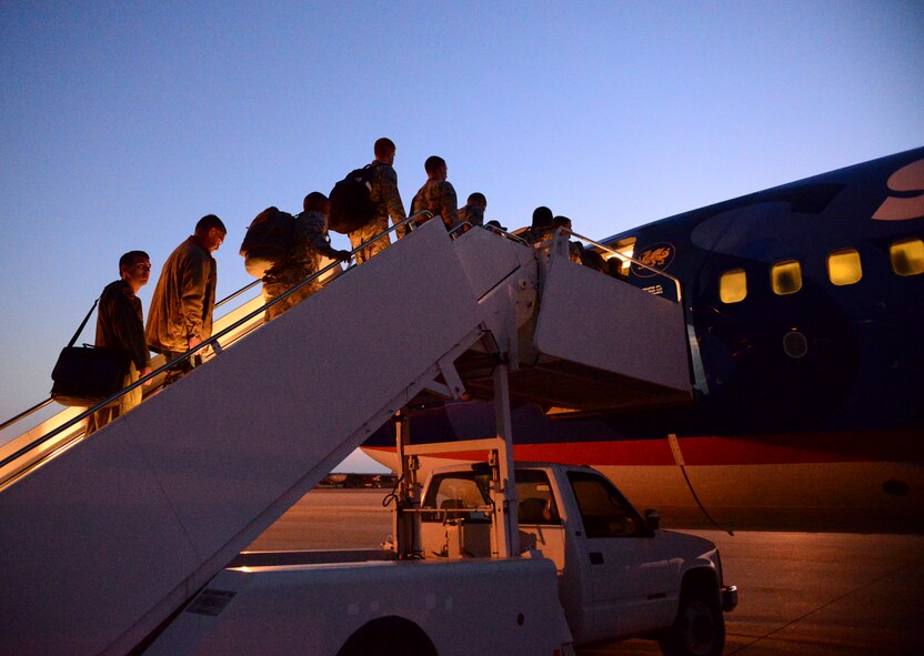 Airmen board an aircraft at Barksdale Air Force Base, Louisiana, as part of a Constant Vigilance deployment exercise May 5, 2015. Constant Vigilance is an annual Air Force Global Strike Command exercise designed to train and assess the command's ability to support conventional and nuclear missions. (U.S. Air Force photo/Senior Airman Benjamin Raughton)