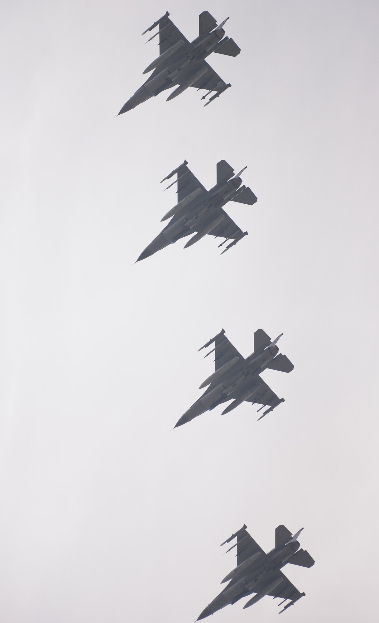F-16s fly in formation during the lead up to operational readiness exercise Beverly Midnight 15-02 May 6, 2015, at Osan Air Base, Republic of Korea. (U.S. Air Force photo by Staff Sgt. Jake Barreiro)