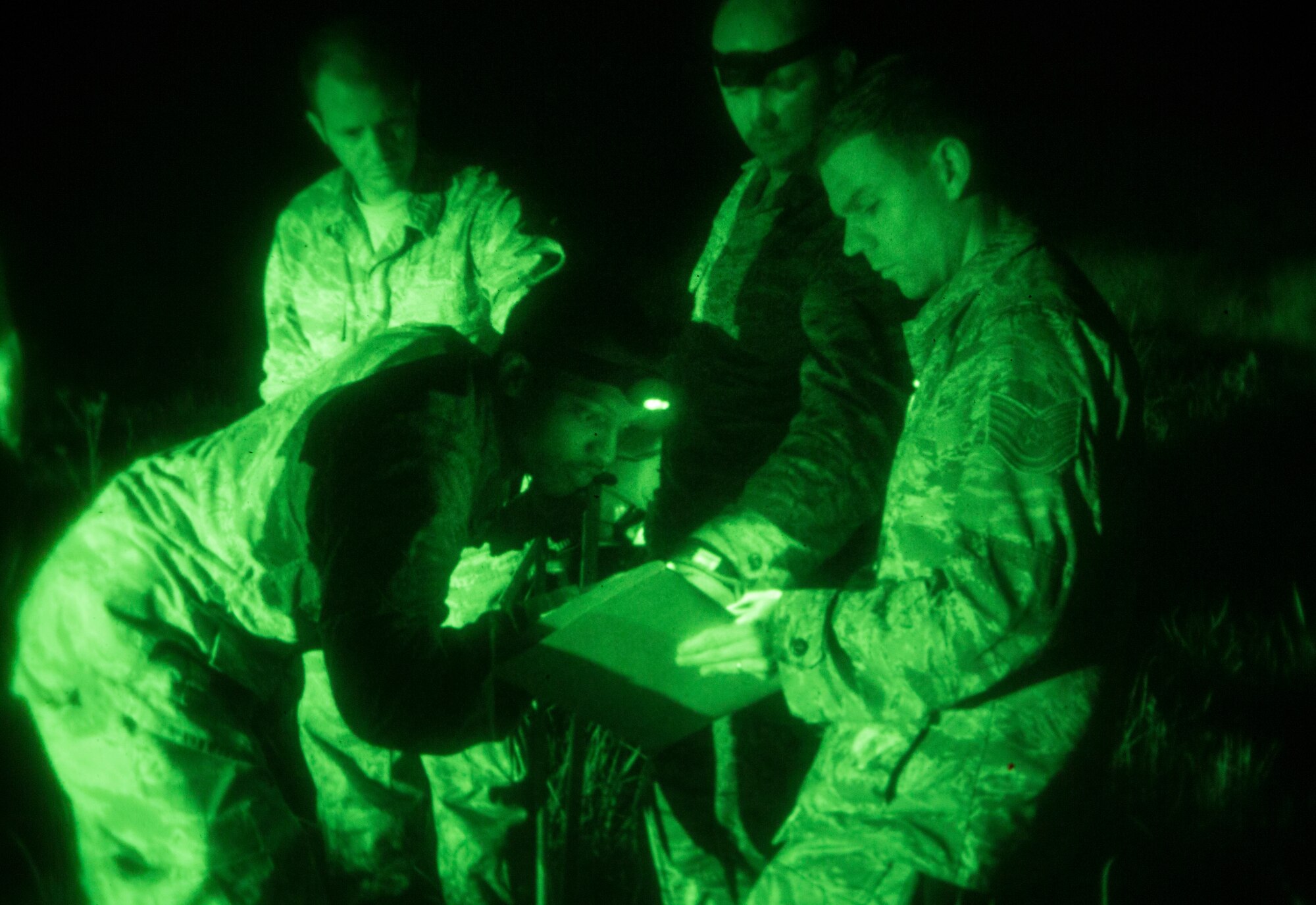 U.S. Air Force engineers with the 36th Contingency Response Group, Joint Task Force-505 write down measurements used to determine the geotechnical engineering properties of the soil at the Tribhuvan International Airport, Kathmandu, Nepal, May 8, 2015. The team tested the soil using a dynamic cone penetrometer to determine its stability following the 7.8 magnitude earthquake.  The pavement evaluation tested to see if there were any significant changes to the soil beneath the runway since the earthquake. Any changes could restrict weight limitations to incoming flights in order to prevent any runway damage. The Nepalese government requested the U.S. Government assistance after a 7.8 magnitude earthquake struck the country April 25, 2015.  JTF-505 works in conjunction with U.S. Agency for International Development and the international community to provide unique capabilities to assist Nepal. (U.S. Marine Corps photo by MCIPAC Combat Camera Staff Sgt. Jeffrey D. Anderson/Released)