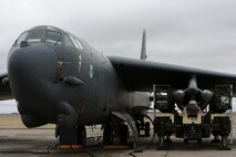 A B-52H Stratofortress sits on the Minot Air Force Base, N.D., flightline after being loaded with air-launched cruise missiles during a Constant Vigilance aircraft generation exercise May 7, 2015. Air Force Global Strike Command routinely conducts training activities and exercises to ensure its forces are ready to perform nuclear deterrence and long-range strike operations. (U.S. Air Force photo/Senior Airman Kristoffer Kaubisch)