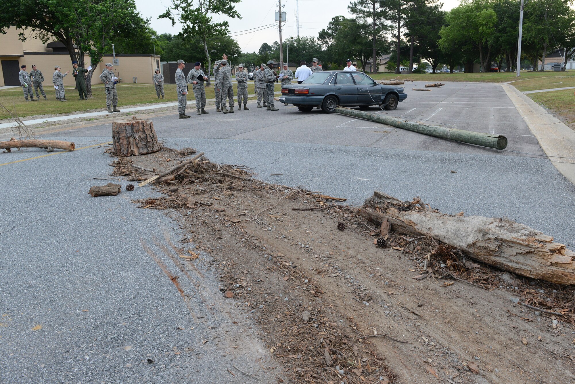 Moody first responders react to a car accident scenario during the Hurricane Response exercise May 13, 2015, at Moody Air Force Base, Ga. Base personnel develop plans and prepare for "worst case" scenarios due to the unpredictability of weather. (U.S. Air Force photo by Airman 1st Class Kathleen D. Bryant/Released)



