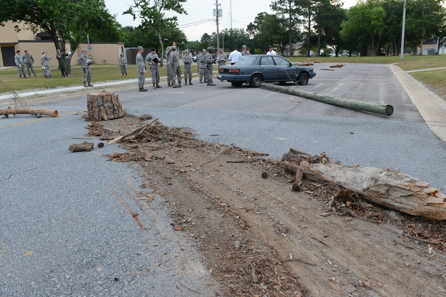 Moody first responders react to a car accident scenario during the Hurricane Response exercise May 13, 2015, at Moody Air Force Base, Ga. Base personnel develop plans and prepare for "worst case" scenarios due to the unpredictability of weather. (U.S. Air Force photo by Airman 1st Class Kathleen D. Bryant/Released)




