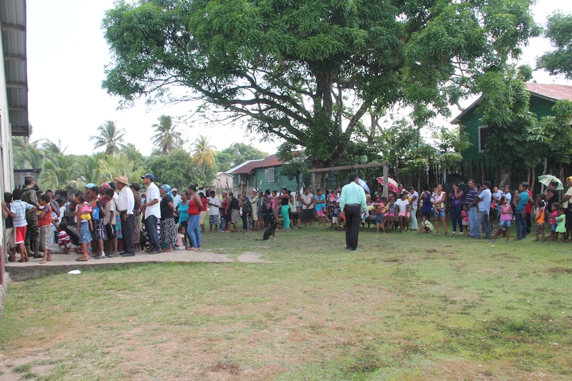 SOTO CANO AIR BASE, Honduras – A line of villagers from Barra Patuca, Honduras, waits to receive medical care from a team of U.S. and Honduran medical practitioners during a medical readiness training exercise April 22-25, 2015. A total of 35 Joint Task Force-Bravo personnel and Honduran medical providers participated in the MEDRETE, providing free medical care to 1,200 people over the course of two days, to build relationships, test capabilities and support the Ministry of Health objectives. (U.S. Army Photo by Sgt. Stephanie Tucker)