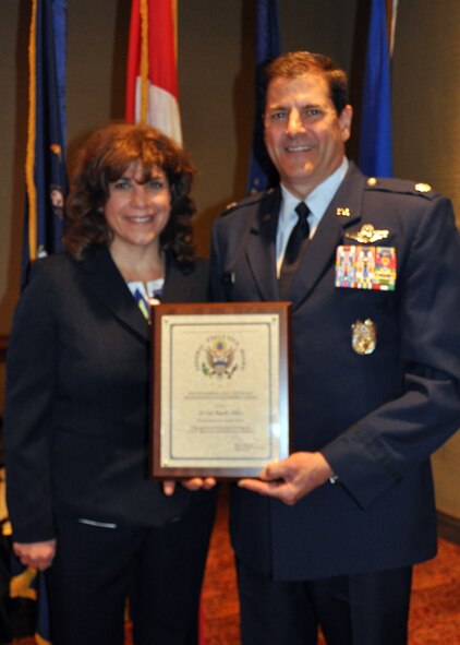 Lt. Col. Mark Ables, 914th Airlift Wing, poses with his wife Nancy after receiving the Distinguished Team Leader Award at the 2015 Excellence in Government awards luncheon May 5, 2015 in Buffalo, NY.  Ables was recognized for leading 80 plus team members through inspections, exercises, training and evaluations as the Wing Director of Inspections.  (Courtesy Photo)