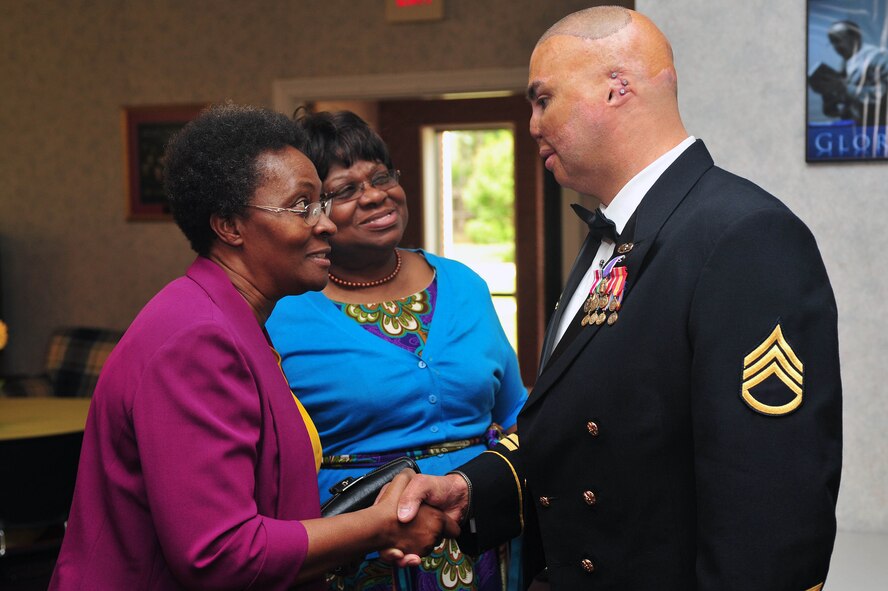 Retired Army Staff Sgt. Shilo Harris meets with members of Team Seymour, May 7, 2015, at Seymour Johnson Air Force Base, North Carolina. Harris visited the base to share his experiences as a wounded warrior during the National  Prayer Breakfast. (U.S. Air Force photo/Senior Airman John Nieves Camacho)