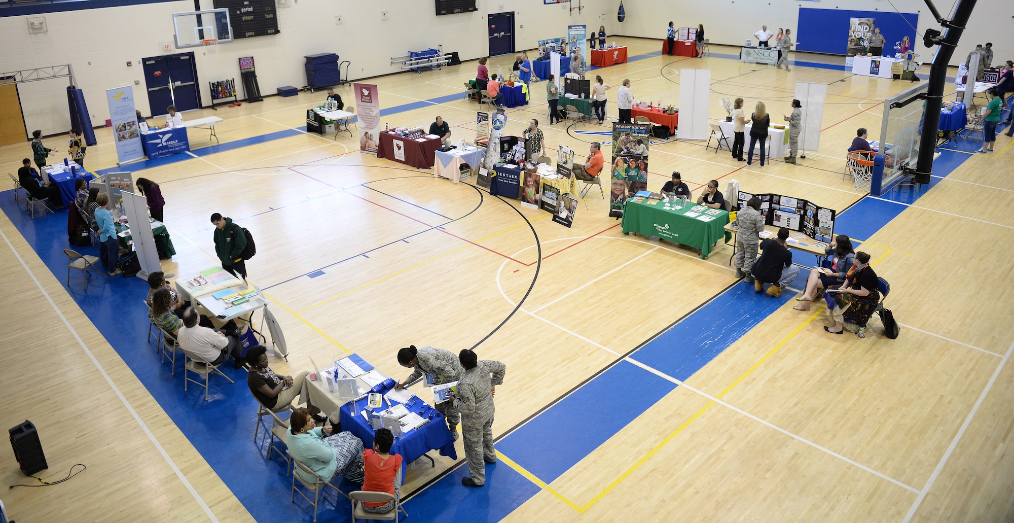 Representatives from more than 40 local agencies and nonprofit organizations provide volunteer opportunity information to U.S. Service members and families during a volunteer fair at Langley Air Force Base, Va., May 8, 2015. Organizations included United Service Organizations, Peninsula Society for the Prevention of Cruelty to Animals, Soldiers and Airmen Against Drunk Driving, and the Mariner’s Museum and many more. (U.S. Air Force photo by Staff Sgt. Teresa J. Cleveland/Released)
