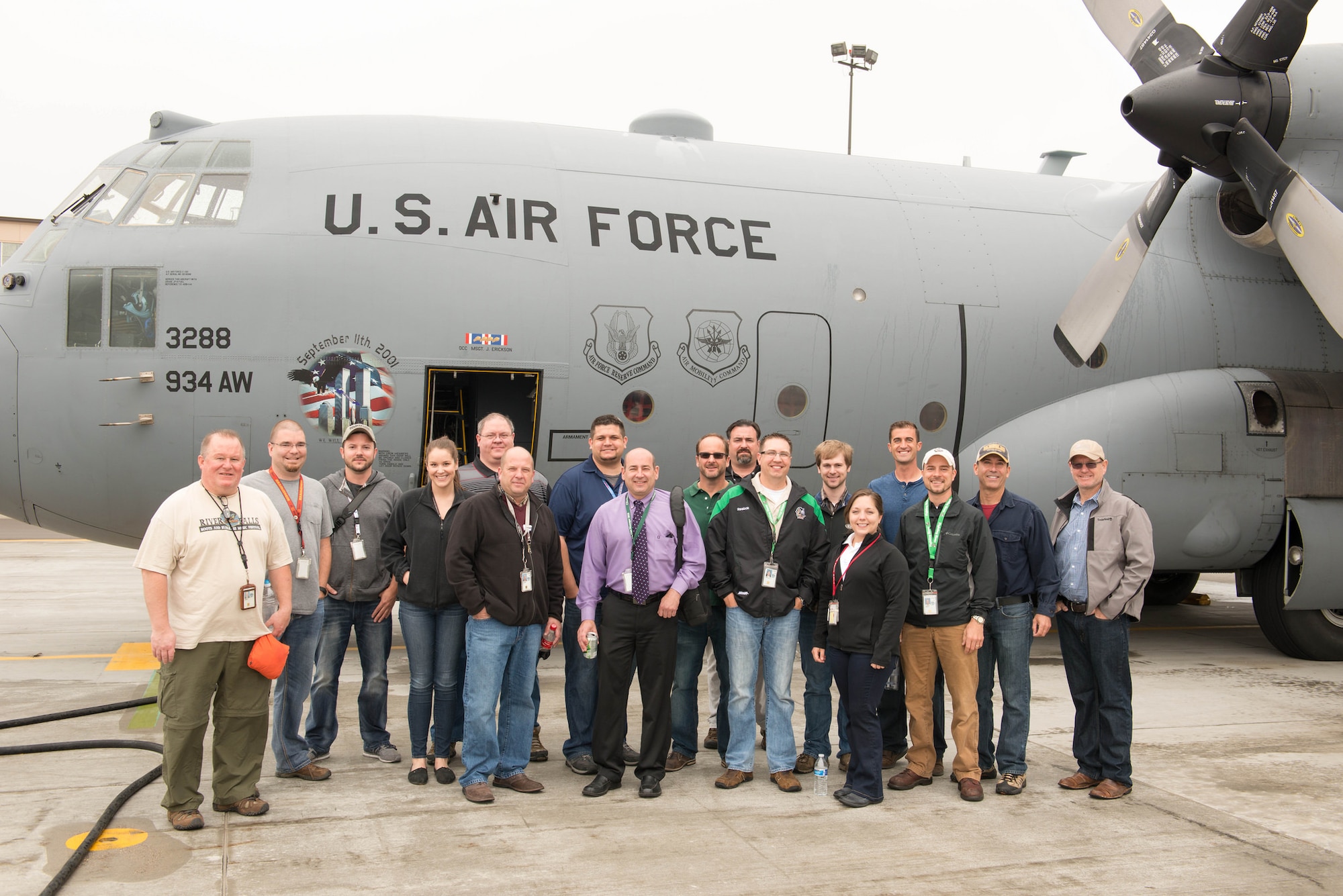 Air Traffic Controllers from Minneapolis-St. Paul pose in front of a 934th Airlift Wing C-130 they would fly on during a familiarization flight May 6. (Air Force Photo/Staff Sgt. Trevor Saylor)