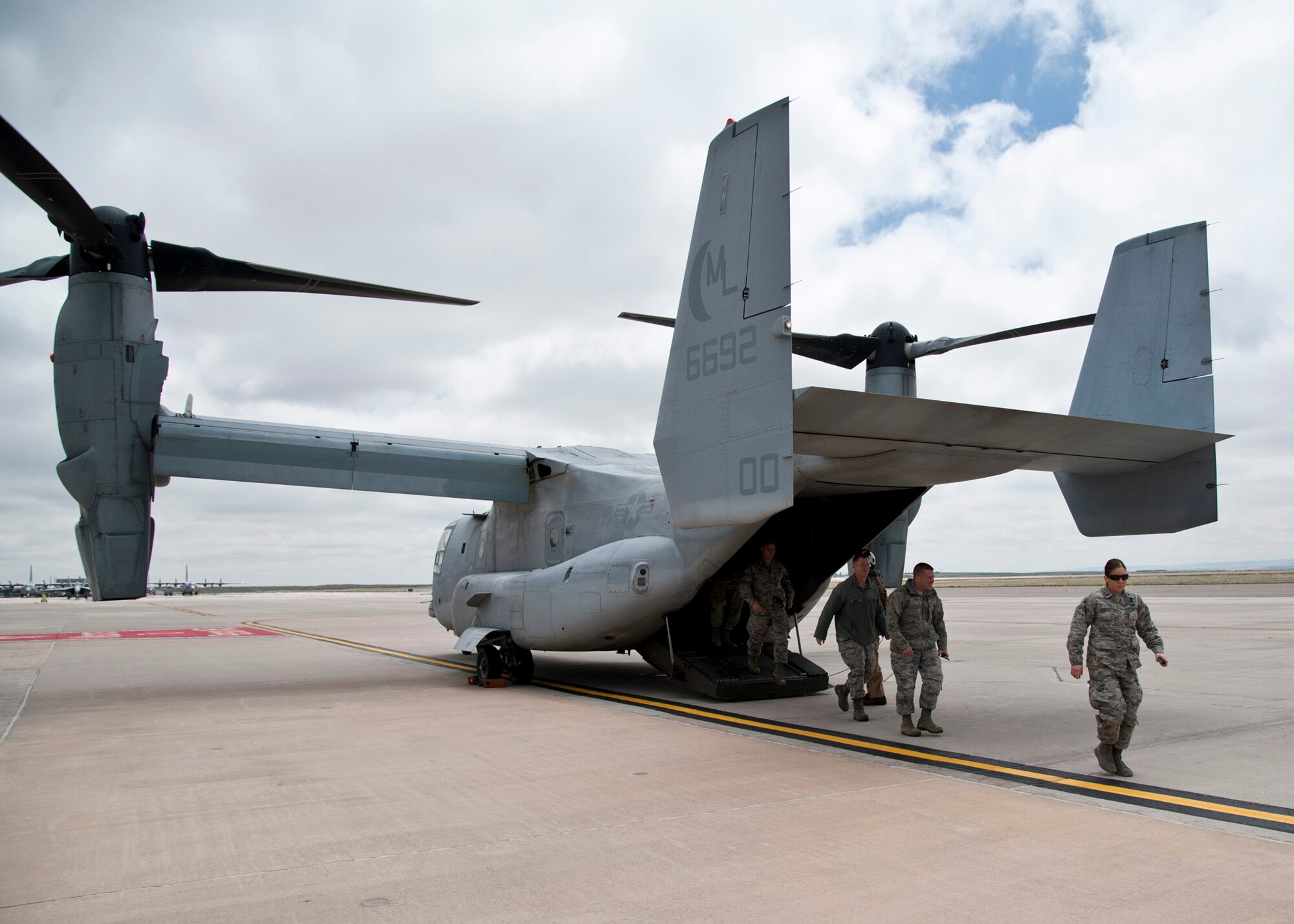 PETERSON AIR FORCE BASE, Colo. – Twenty Team Pete members take a ride in a MV-22 Osprey, May 11, 2015. The Osprey, along with other aircraft, are part of a joint-service close air support exercise with the members of the Marine Air Group-41 being hosted at Fort Carson, with logistical support from the 21st Space Wing at Peterson. (U.S. Air Force photo by Senior Airman Tiffany DeNault)