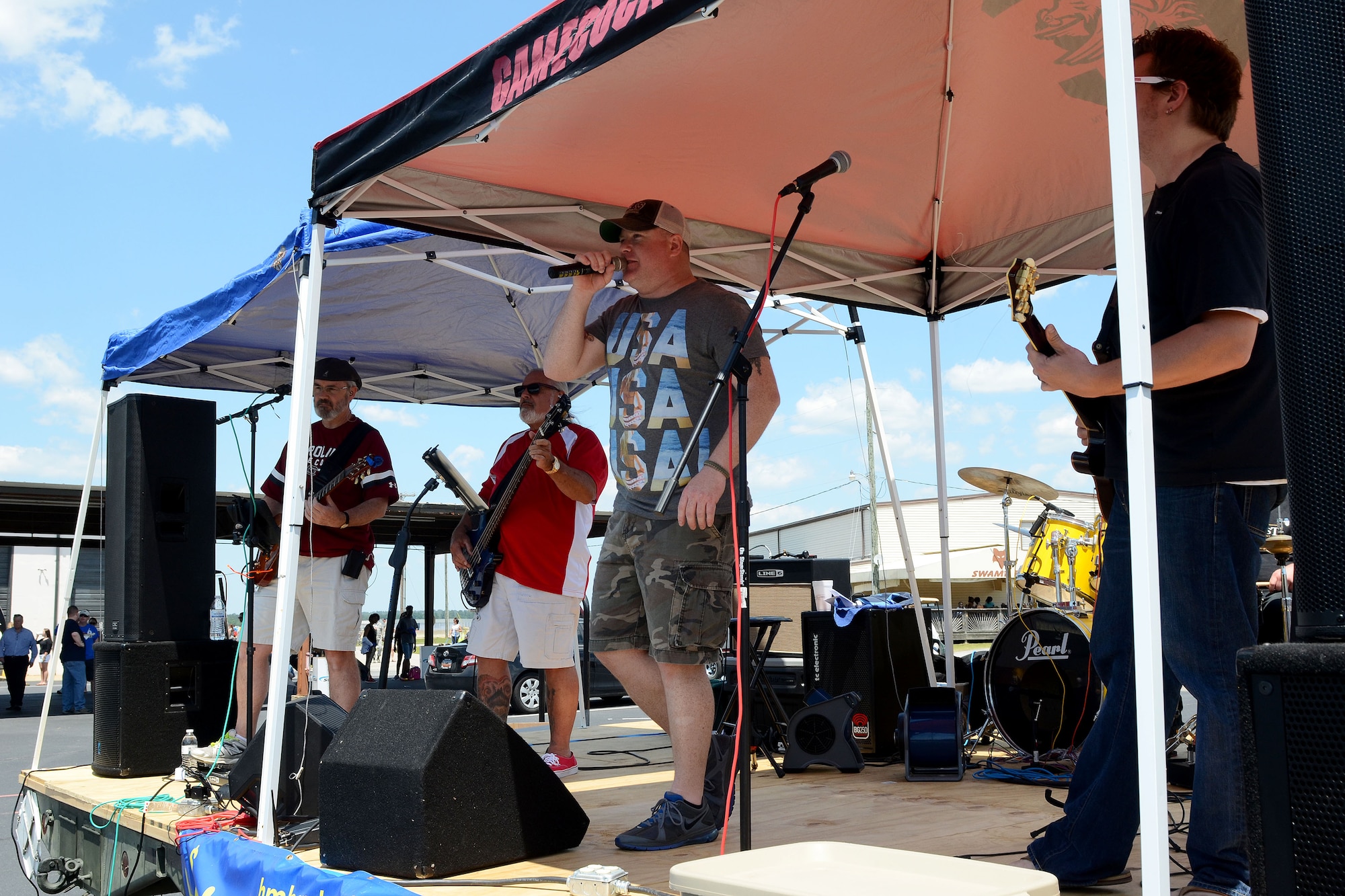 Swamp Fox Airmen and families gather for fun and fellowship during the 169th Fighter Wing Family Day at McEntire Joint National Guard Base, S.C., May 2, 2015. Local businesses and base support programs provided food and event activities to show their appreciation for the continued service of South Carolina Air National  Guard and 169th Fighter Wing families and Airmen. (U.S. Air National Guard photo by Airman 1st Class Ashleigh Pavelek/Released)