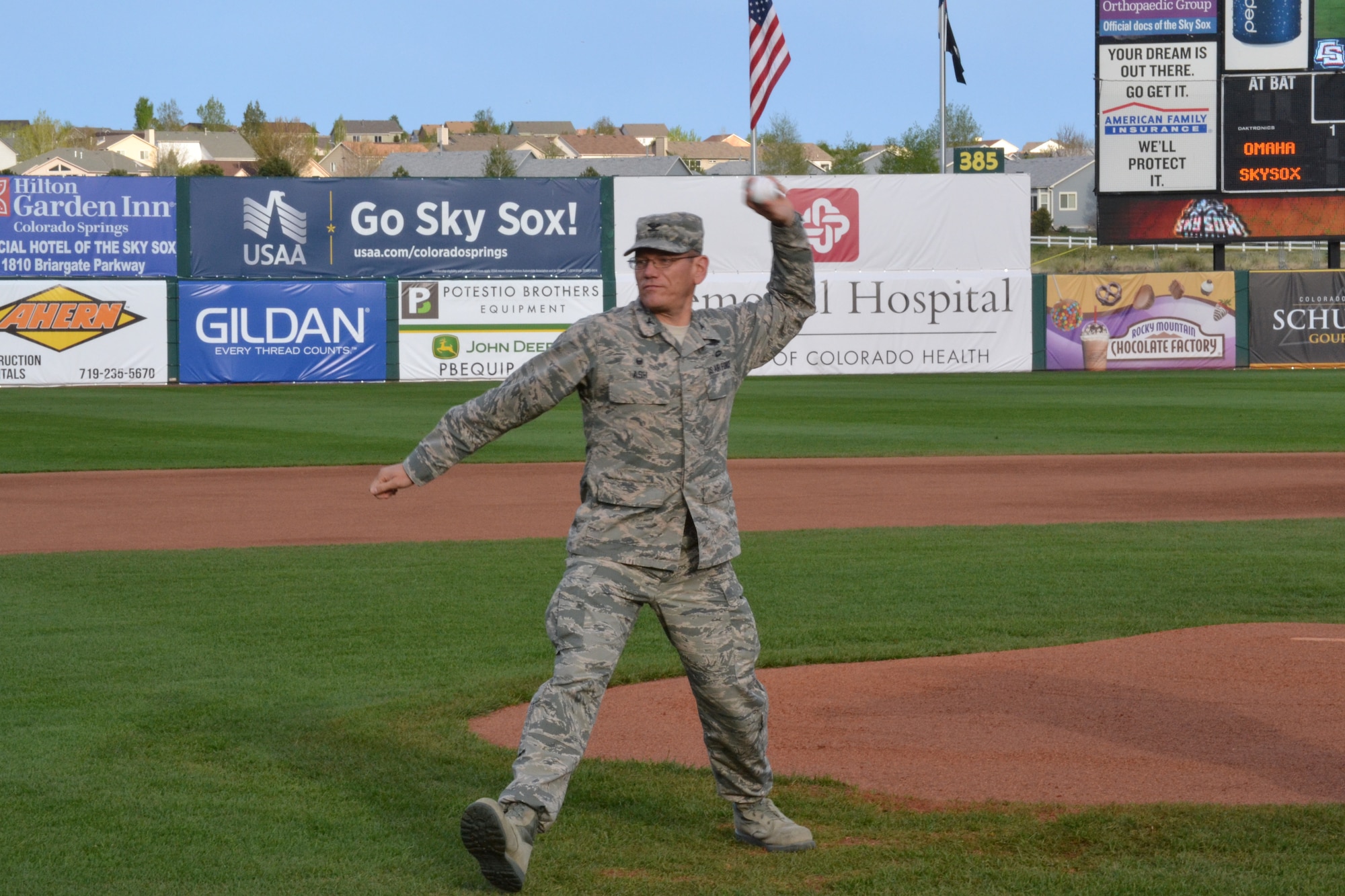 COLORADO SPRINGS, Colo. – Col. Reginald Ash, 21st Mission Support Group commander, throws out the ceremonial first pitch at the Sky Sox game May 1 at Security Service Field. The game was part of the team’s military appreciation night, and saw the Sky Sox beat the Omaha Storm Chasers 16-4. (U.S. Air Force photo by Brian Hagberg)