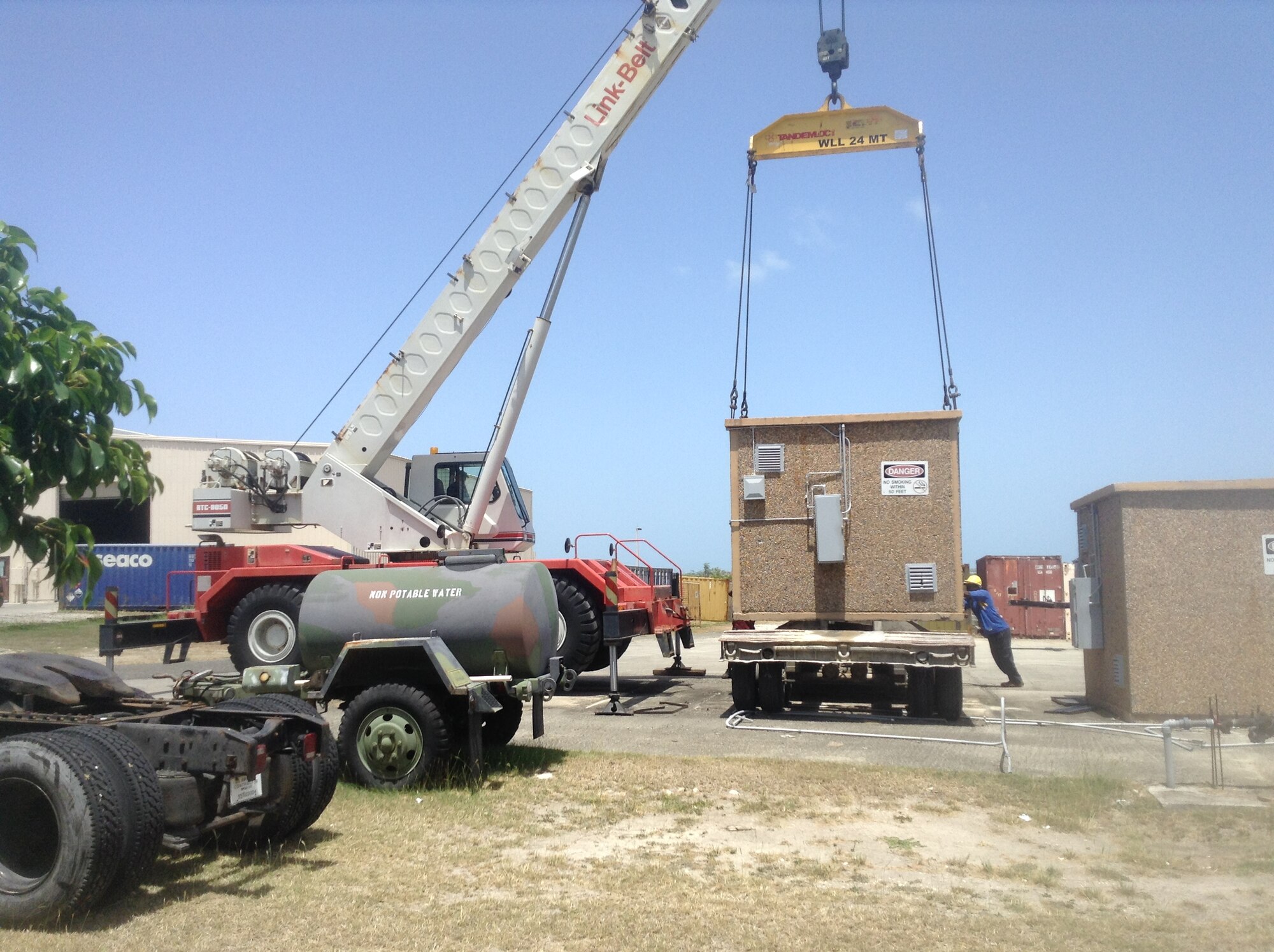 Senior Master Sgt. Kwame Tawiah (not pictured), 512th Logistics Readiness Squadron,
oversees the movement of a building in preparation for shipment May 1, 2015, at Antigua Air Station, Antiqua. Tawiah, who volunteered for this assignment through the Reserve Vacancy System, is deployed there assisting with the closure of the military
installation and ensuring U.S. assets are returned or accounted for. (U.S. Air Force photo/Senior Master Sgt. Kwame Tawiah)
