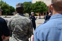 ALTUS AIR FORCE BASE, Okla. – Casey Bussett, pilot and safety officer for the Air Evac Lifeteam, speaks about how the air evacuation team works with members of the Altus police and fire departments and the Altus AFB fire department at the Altus Fire Department, May 11, 2015. These response teams hold group training several times a year to review how their efforts work together. (U.S. Air Force photo by Senior Airman J. Zuriel Lee/Released)