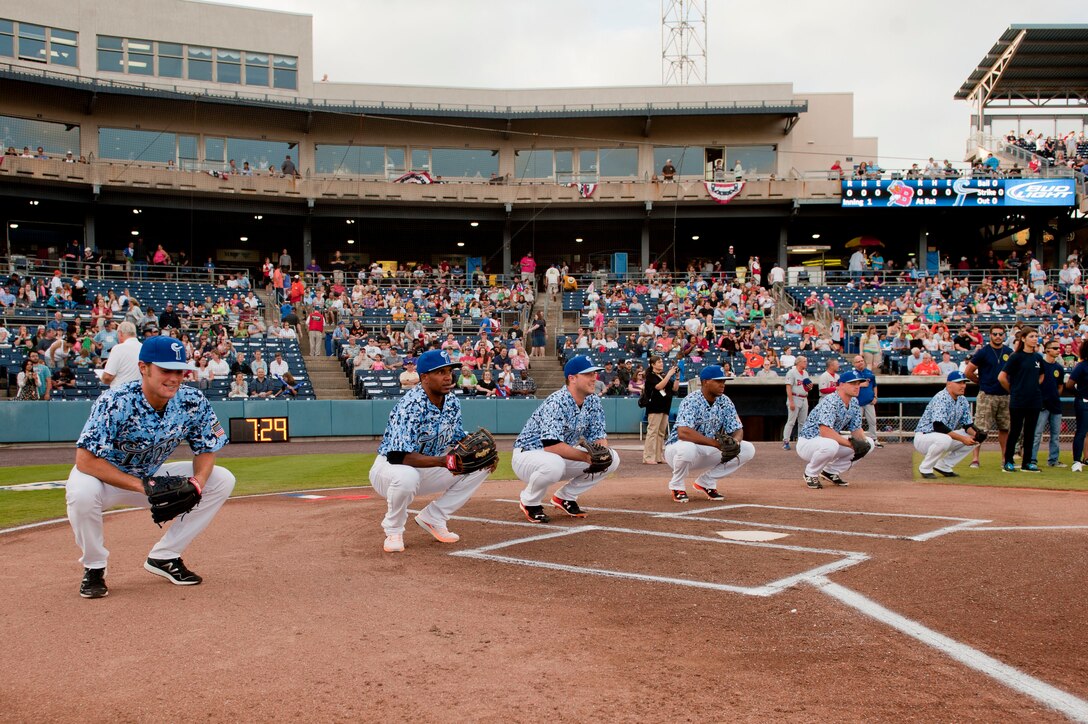 The Tides wear digital camouflage print to honor military members in attendance during the Norfolk Tides Armed Forces Appreciation night in Norfolk, Va., May 9, 2015. The Norfolk Tides won 1-0 against the Buffalo Bisons. (U.S. Air Force photo by Staff Sgt. Stephanie Rubi/Released)
