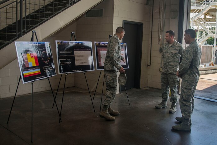 Maj. Jason Okumura, 437th Aerial Port Squadron commander, details 437th APS safety records and plans to Maj. Gen. Kurt F. Neubauer on mission capabilities, May 6, 2015, at Joint Base Charleston, S.C. Neubauer is the Air Force Chief of Safety, Headquarters U.S. Air Force, Washington, D.C., and commander, Air Force Safety Center, Kirtland Air Force Base, N.M. He develops, executes and evaluates all Air Force aviation, ground, weapons, space and system mishap prevention, and nuclear surety programs to preserve combat readiness. In addition to touring Joint Base Charleston, Neubauer was the guest speaker at the Charleston Metro Chamber of Commerce's State of the Region: Salute to the Military event May 7, 2015 on the USS Yorktown at Patriot’s Point in Mount Pleasant, S.C. (U.S. Air Force photo/Senior Airman George Goslin)