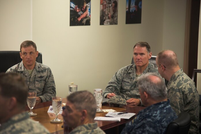 Col. Jeffrey DeVore, 628th Joint Base Charleston, briefs Maj. gen. Kurt F. Neubauer on the joint base mission capabilities, May 6, 2015, at Joint Base Charleston, S.C. Neubauer is the Air Force Chief of Safety, Headquarters U.S. Air Force, Washington, D.C., and commander, Air Force Safety Center, Kirtland Air Force Base, N.M. He develops, executes and evaluates all Air Force aviation, ground, weapons, space and system mishap prevention, and nuclear surety programs to preserve combat readiness. In addition to meeting with senior leaders, Neubauer toured the 437th Aerial Port Squadron, the 437th Maintenance Squadron’s Corrosion Control Facility, the 628th Civil Engineering Squadron’s Explosives Ordnance Disposal unit as well as a tour of the Naval Nuclear Power Training Command and a windshield tour of other vital units located on the Weapons Station property. Neubauer also served as the guest speaker at the Charleston Metro Chamber of Commerce's State of the Region: Salute to the Military event May 7, 2015 on the USS Yorktown at Patriot’s Point in Mount Pleasant, S.C. (U.S. Air Force photo/Senior Airman George Goslin)