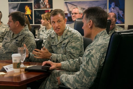 Colonel John Lamontagne, 437th Airlift Wing commander, briefs Maj. Gen. Kurt Neubauer on the wing’s mission capabilities, May 6, 2015, at Joint Base Charleston, S.C. Neubauer is the Air Force Chief of Safety, Headquarters U.S. Air Force, Washington, D.C., and commander, Air Force Safety Center, Kirtland Air Force Base, N.M. He develops, executes and evaluates all Air Force aviation, ground, weapons, space and system mishap prevention, and nuclear surety programs to preserve combat readiness. In addition to meeting with senior leaders, Neubauer toured the 437th Aerial Port Squadron, the 437th Maintenance Squadron’s Corrosion Control Facility, the 628th Civil Engineering Squadron’s Explosives Ordnance Disposal unit as well as a tour of the Naval Nuclear Power Training Command and a windshield tour of other vital units located on the Weapons Station property. Neubauer also served as the guest speaker at the Charleston Metro Chamber of Commerce's State of the Region: Salute to the Military event May 7, 2015 on the USS Yorktown at Patriot’s Point in Mount Pleasant, S.C. (U.S. Air Force photo/Senior Airman George Goslin)