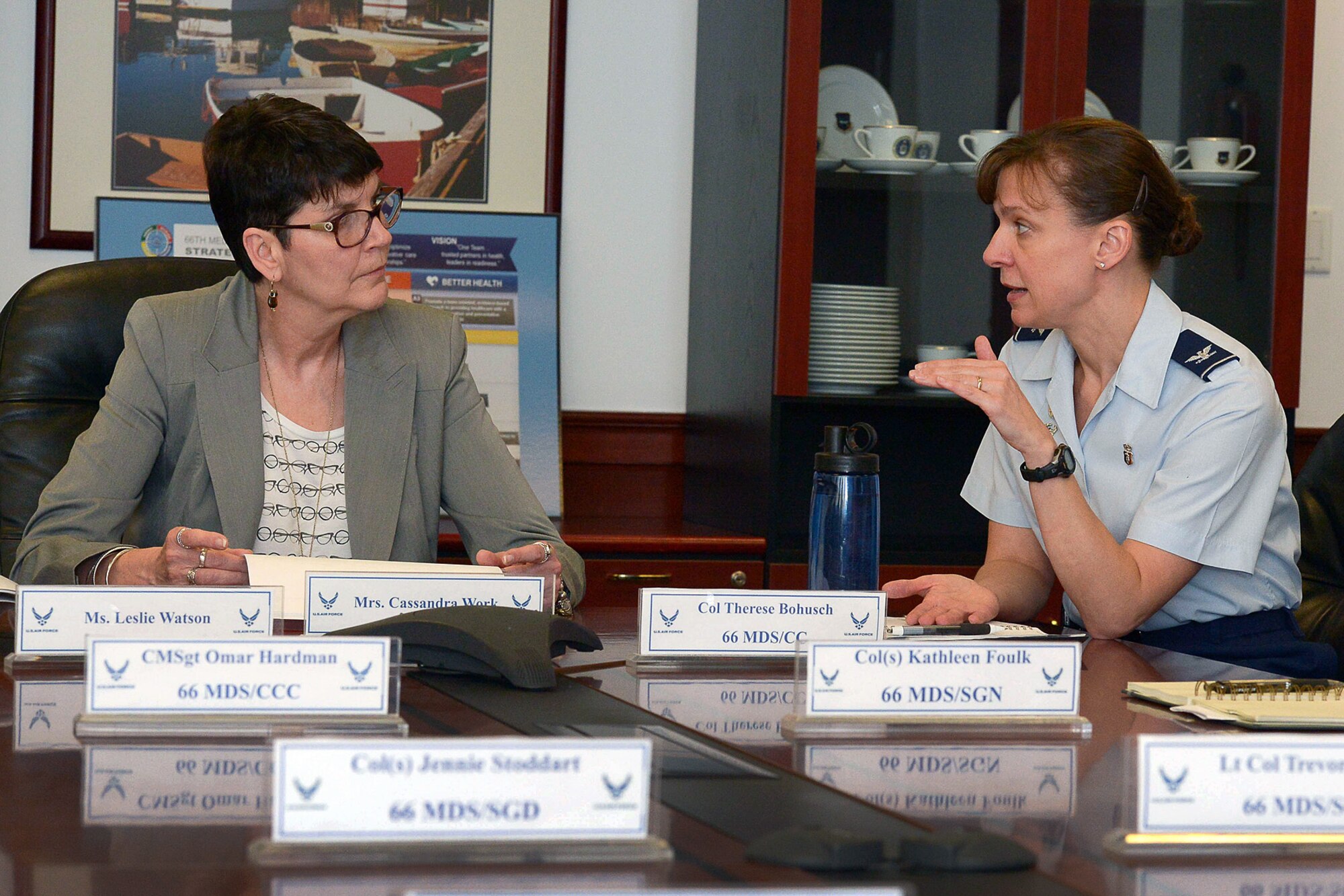 Cassandra Work, wife of Deputy Secretary of Defense Bob Work, listens as Col. Therese Bohusch, 66th Medical Squadron commander, provides an overview of the squadron during a visit to the clinic May 12. Hanscom, while not a joint base, is the only active duty Air Force Base in the six-New England states and New York. The base provides medical care to all active duty Airmen in this geographic area as well as service members from other branches of the military. (U.S. Air Force photo by Jerry Saslav)