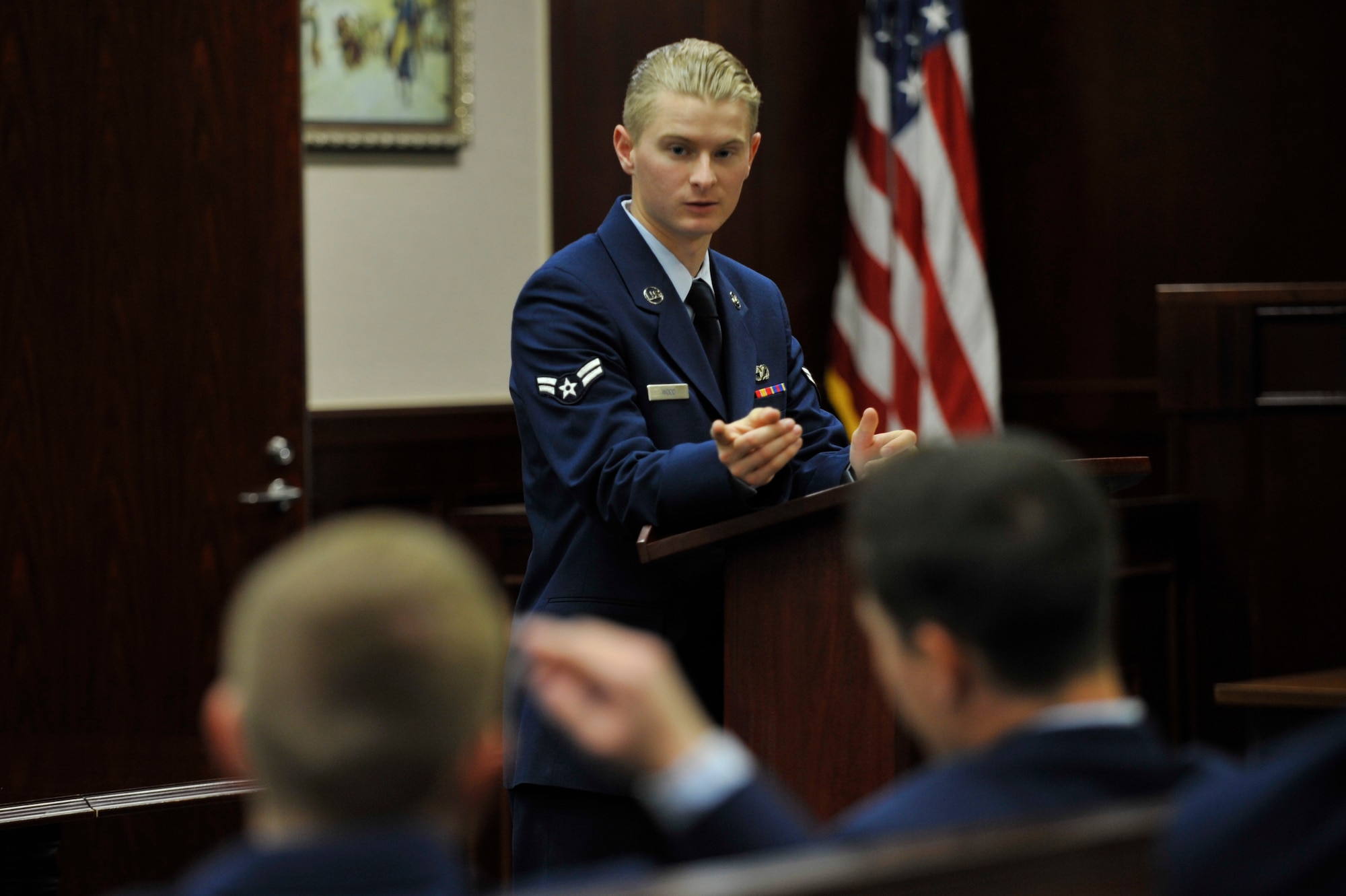 U.S. Air Force Airman 1st Class Brian Wood, 35th Logistics Readiness Squadron vehicle and vehicular equipment maintenance apprentice, and jury president, leads a mock sexual assault case discussion before the final vote is conducted at Misawa Air Base, Japan, April 24, 2015. Mock trials provide insight to Airmen by showing the correlation between sexual assault and reduced inhibitions. Guidance was given to prevent sexual assault including drinking responsibly, applying the wingman concept, and using bystander intervention. (U.S. Air Force photo by Senior Airman Jose L. Hernandez-Domitilo/Released)