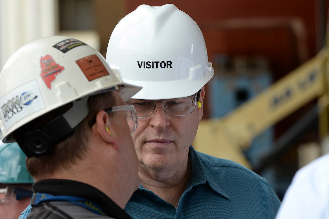 Deputy Defense Secretary Bob Work tours Bath Iron Works in Bath, Maine, May 12, 2015. Work visited the facility to observe next-generation defense technology and meet with senior industry leaders. 
