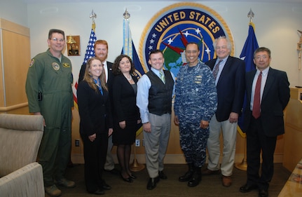 U.S. Navy Adm. Cecil D. Haney (third from right), U.S. Strategic Command commander, welcomes members of the USSTRATCOM Deterrence and Assurance Academic Alliance to Offutt Air Force Base, Neb., May 11, 2015. Haney invited the alliance representatives to USSTRATCOM headquarters to discuss a variety of topics related to the command's global strategic missions. The meeting is part of his ongoing effort to build and maintain enduring relationships with partner organizations from the private sector, academia and allied nations to address challenges in the strategic operating environment. "The Academic Alliance aims to stimulate new thinking and develop future generations of deterrence and assurance practitioners by collaborating with local and national universities, promoting mission-related research topics within their departments, and participating in speaking engagements and workshops," said Michelle Black, USSTRATCOM's academic alliance coordinator. The alliance currently consists of USSTRATCOM and eight local and national universities. USSTRATCOM is one of nine DoD unified combatant commands and is charged with strategic deterrence; space operations; cyberspace operations; joint electronic warfare; global strike; missile defense; intelligence, surveillance and reconnaissance; combating weapons of mass destruction; and analysis and targeting. <br />Left to right - USSTRATCOM Academic Alliance members who attended the meeting: U.S. Air Force Maj. Gen. David D. Thompson, U.S. Strategic Command plans and policy director; Michelle Black; Dr. Tyler White, University of Nebraska Lincoln assistant professor of practice political science; Dr. Lana Obradovic, University of Nebraska Omaha assistant professor of political science; Dr. Matthew Crosston, Bellevue University professor of political science; Adm. Haney; Dr. Robert Oberst, Nebraska Wesleyan University professor of political science; and Dr. Maorong Jiang, Creighton University director of the Asian World Center. (USST