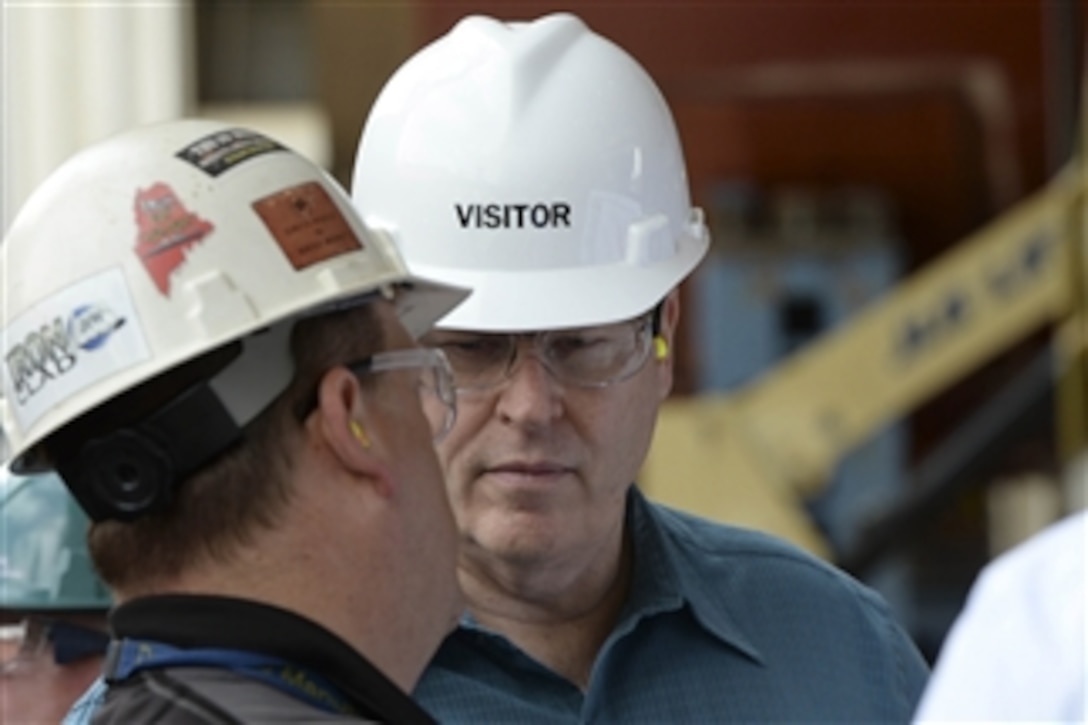 Deputy Defense Secretary Bob Work tours Bath Iron Works in Bath, Maine, May 12, 2015. Work visited the facility to observe next-generation defense technology and meet with senior industry leaders.