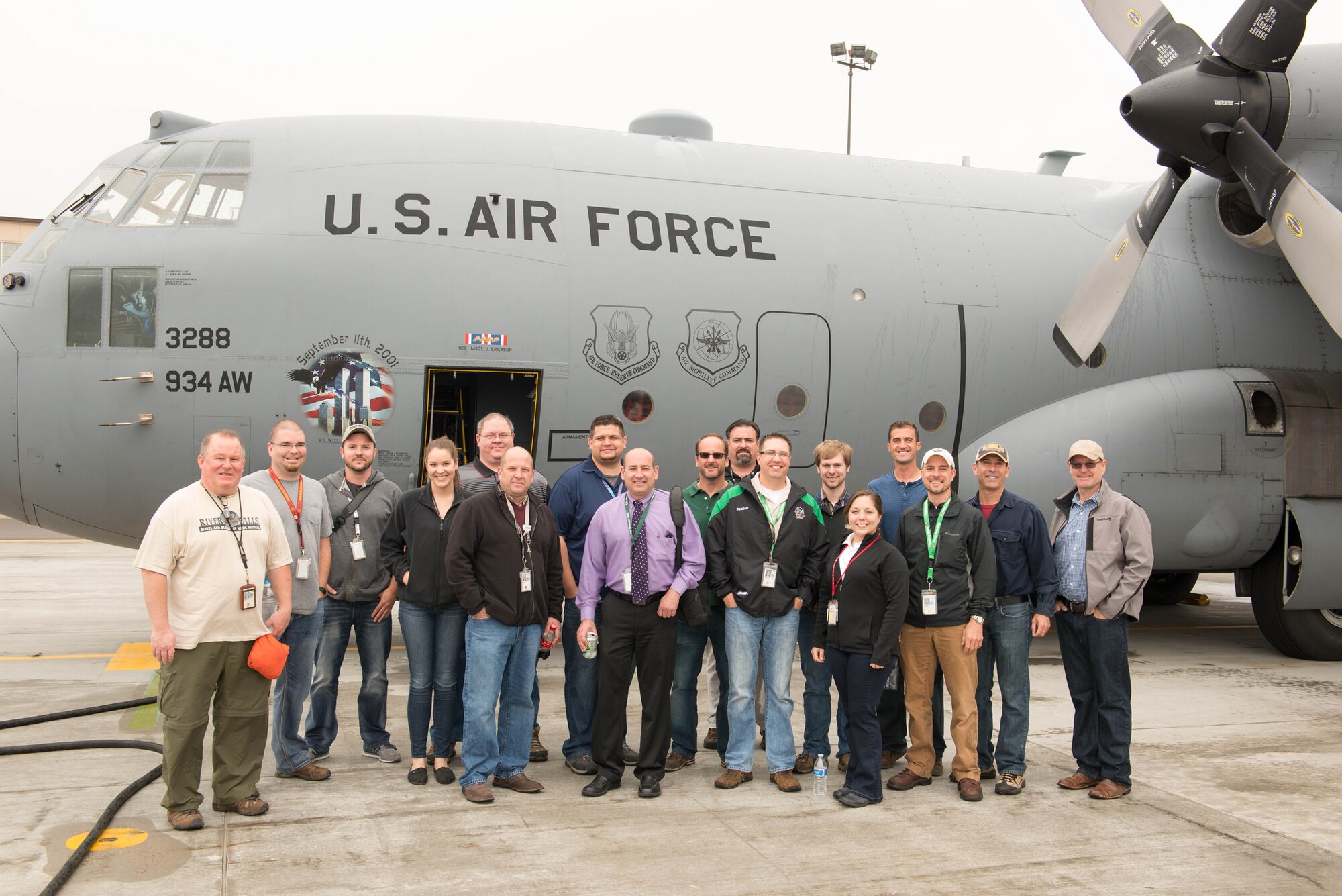 Air Traffic Controllers from Minneapolis-St. Paul pose in front of a 934th Airlift Wing C-130 they would fly on during a familiarization flight May 6. (Air Force Photo/Staff Sgt. Trevor Saylor)
