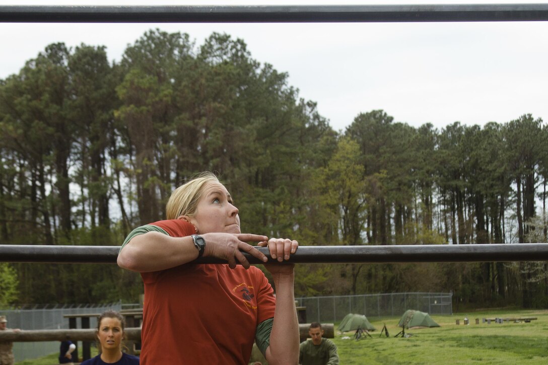 U.S. Marine Corps Marine Corps officer candidate Sara Walker, a graduate of Saint Joseph’s University, negotiates the obstacle course during a training exercise at the Naval Support Activity Annapolis, Maryland, April 25, 2015. The exercise was designed to prepare officer candidates from Recruiting Stations Baltimore and Frederick for the physical and mental challenges of Marine Corps Officer Candidate School. OCS trains, screens and evaluates candidates, who must demonstrate a high level of leadership potential and commitment to success in order to earn a commission as an officer in the United States Marine Corps. (U.S. Marine Corps photo by Sgt. Bryan Nygaard/Released)