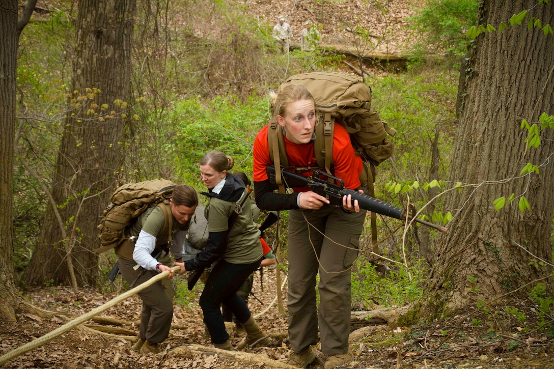 Marine Corps officer candidates evacuate a simulated casualty up a ravine during a training exercise at the Naval Support Activity Annapolis, Maryland, April 25, 2015. The exercise was designed to prepare officer candidates from Recruiting Stations Baltimore and Frederick for the physical and mental challenges of Marine Corps Officer Candidate School. OCS trains, screens and evaluates candidates, who must demonstrate a high level of leadership potential and commitment to success in order to earn a commission as an officer in the United States Marine Corps. (U.S. Marine Corps photo by Sgt. Bryan Nygaard/Released)