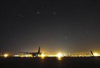 An Airman assigned 1st Special Operations Logistics Readiness Squadron marshals an MC-130 Talon II preparing to refuel a U-28A during Forward Area Refueling Point training on Hurlburt Field, Fla., May 7, 2015. Special teams of fuels Airmen provide a critical capability for wartime and humanitarian missions as FARP operations expand the role of special operation forces around the world. They provide a means of "hot" refueling from a tanker aircraft to various types of fixed and rotor-wing receiver aircraft.
 (U.S. Air Force photo/Airman Kai L. White) 
