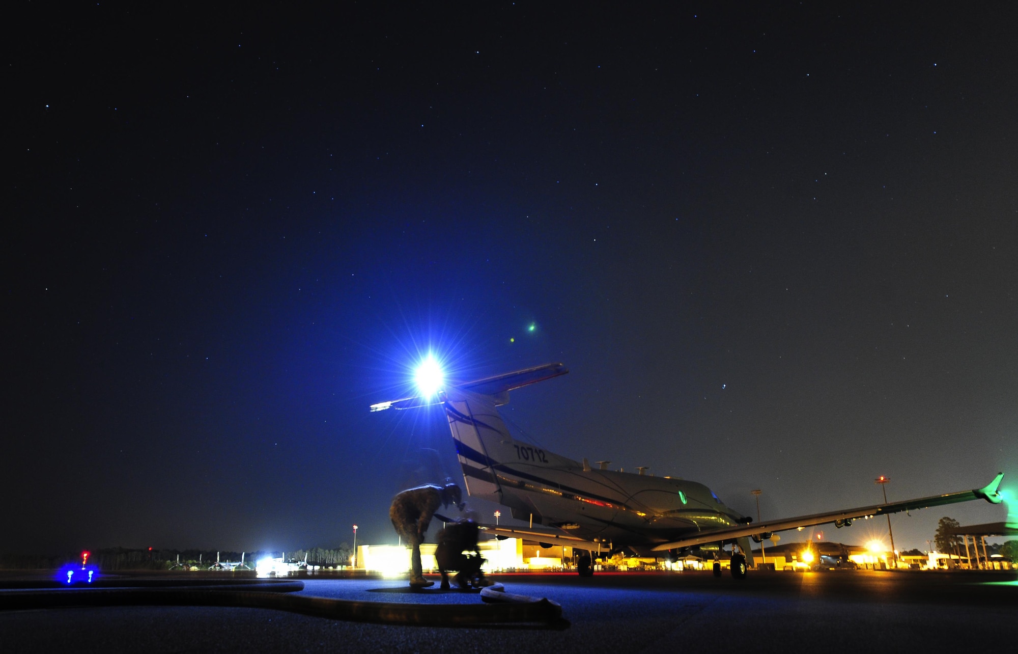 Airmen assigned to the 1st Special Operations Logistics Readiness Squadron conduct a hot refuel on a U-28A during Forward Area Refueling Point training on Hurlburt Field, Fla., May 7, 2015. FARP first came about after the 1980 Iran hostage rescue attempt. After this event, the Air Force realized the need for a highly-efficient way to transfer fuel from one aircraft to another, in non-standard and hostile environments. (U.S. Air Force photo/Airman Kai L. White)