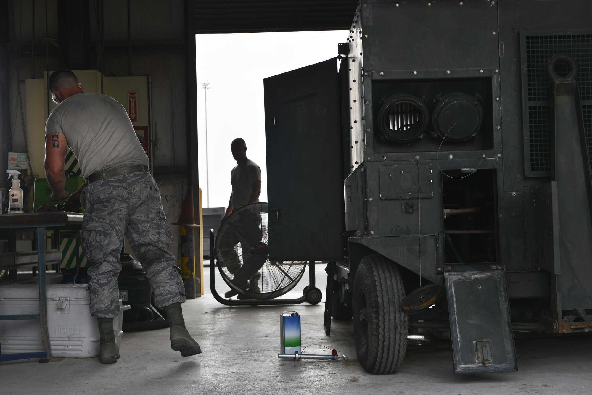 Staff Sgt. Harrison Danforth, 379th Expeditionary Maintenance Squadron, completes his tool check prior to beginning maintenance on an aircraft air conditioning unit May 7, 2015 at Al Udeid Air Base, Qatar. With the extreme heat conditions in Qatar it is recommended to have a 15 minute work with a 45 minute rest schedule and a “buddy system”  to keep their wingman safe. (U.S. Air Force photo by Staff Sgt. Alexandre Montes)  