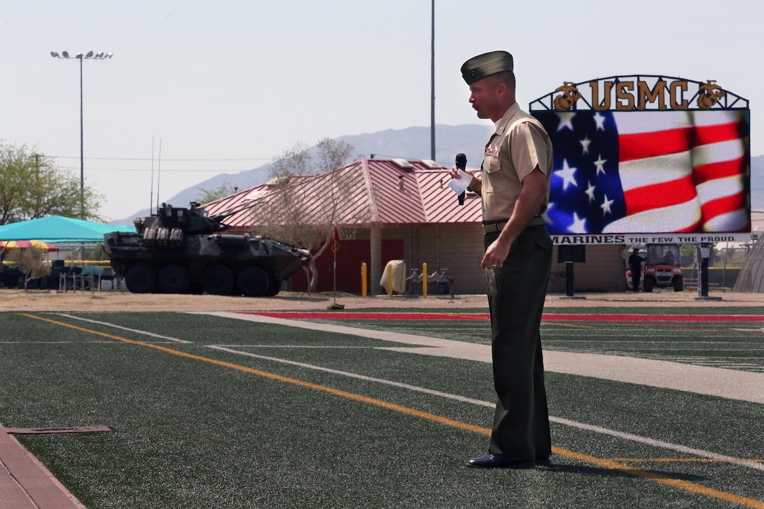 Lt. Col. Matt Good, former commanding officer, 3rd Light Armored Reconnaissance Battalion, thanks all of his mentors, friends and family members during 3rd LAR’s change of command ceremony at Felix Field, May 7, 2015. According to Good, being part of 3rd LAR was one of his best experiences during his career. (Official Marine Corps photo by Lance Cpl. Thomas Mudd/ Released)