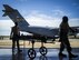 Soldiers, assigned to the South Carolina National Guard, bring a victim on a gurney from a C-17 Globemaster III into a hangar to be treated during the Winds of Fury exercise May 13, 2015, at Fort Jackson, S.C. The exercise was to efficiently receive, regulate, transport and track patients to and from Natural Disaster Medical System hospitals within a 50 mile radius of Columbia Airport by ambulance and other transport vehicles. (U.S. Air Force photo by Senior Airman Tom Brading)