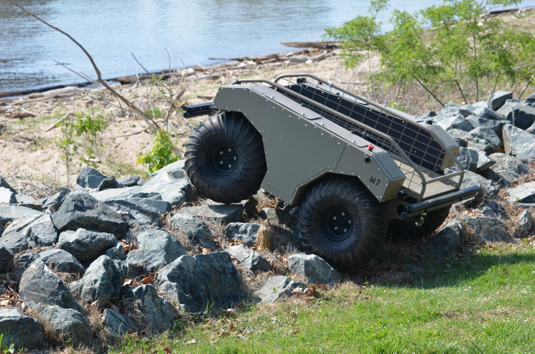 During a Marine Corps Intelligence Activity exercise May 5, the Multi-Utility Tactical Transport, or MUTT, is put through its paces at the Town of Quantico’s riverside park and in the Potomac River. The unmanned vehicle can carry up to 600 pounds; roll over boulders, sand and debris; and even swim. 