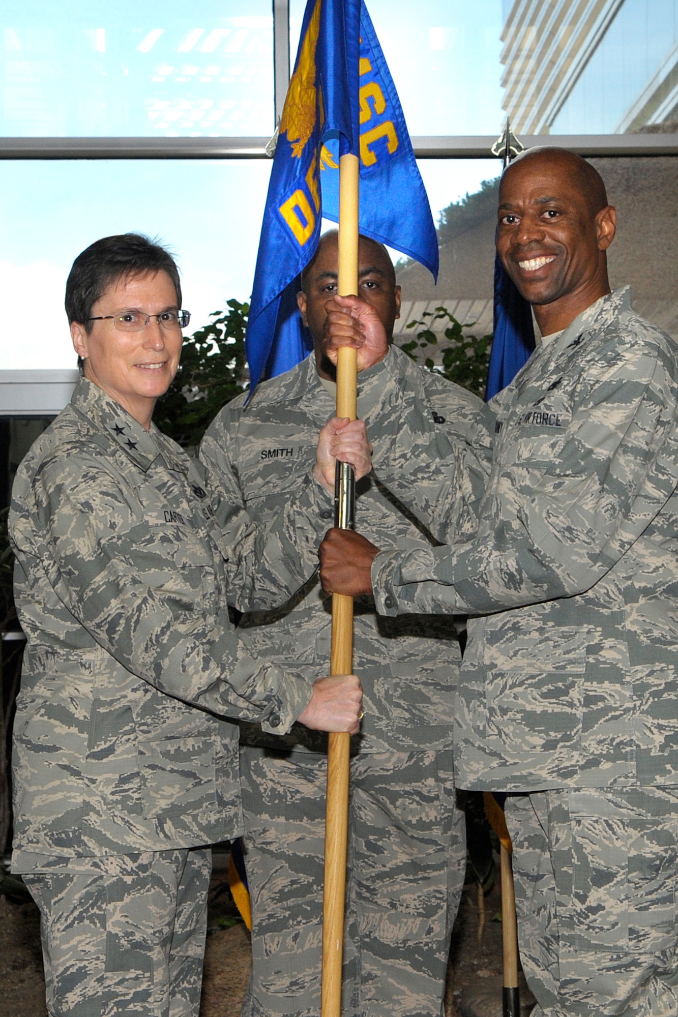 Air Force Installation and Mission Support Center Commander Maj. Gen. Theresa Carter activated AFIMSC Detachment 1 at Air Force Space Command May 12 in a ceremony here. Carter presided over the ceremony as Col. Nathan Mooney assumed command of the newly established detachment. (U.S. Air Force photo/Duncan Wood/Released) 