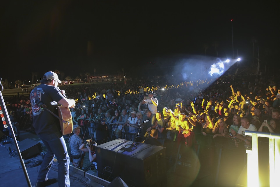 Rodney Atkins, country music singer, performs for Combat Center patrons during the ‘We Salute You Fest’ at Lance Cpl. Torrey L. Gray Field, May 9, 2015. In addition to Atkins’ performance, the event featured a Family Fun Day and Commanding General’s Car and Bike show. (Official Marine Corps photo by Pfc. Levi Schultz/Released)