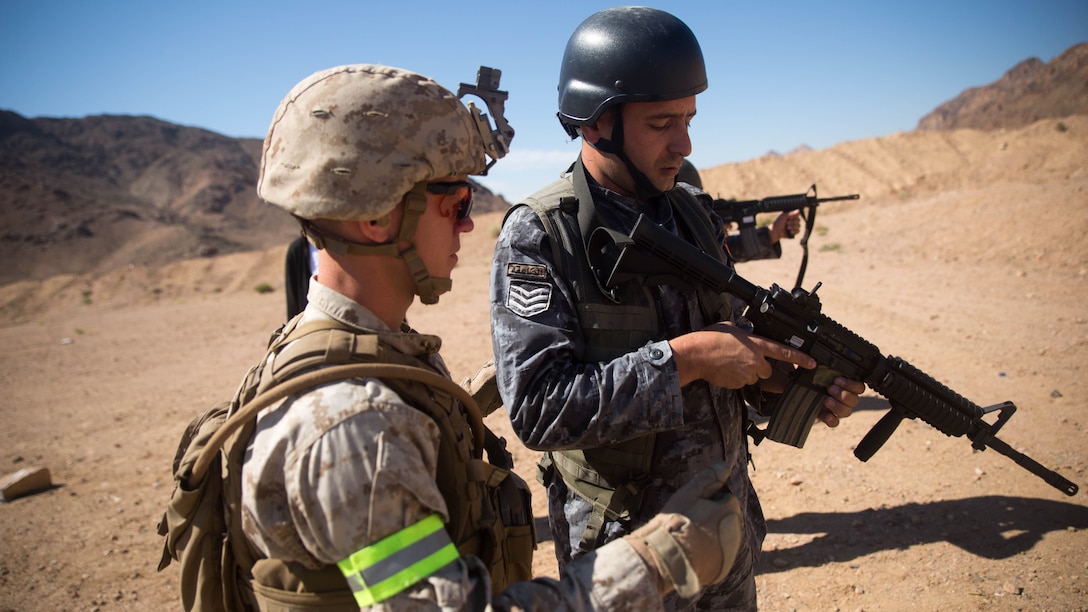 United States Marines from Easy Company, 2nd Battalion, 2nd Marine Regiment partnered with members of the Jordanian Armed Forces to complete a close-quarters marksmanship range May 6, 2015, during Eager Lion 15. Eager Lion is an annual, multinational training exercise designed to build interoperability, promote partnerships and exchange military expertise with 16 partner nations and NATO. Eager Lion 15 takes place in the Hashemite Kingdom of Jordan from May 5-19. 