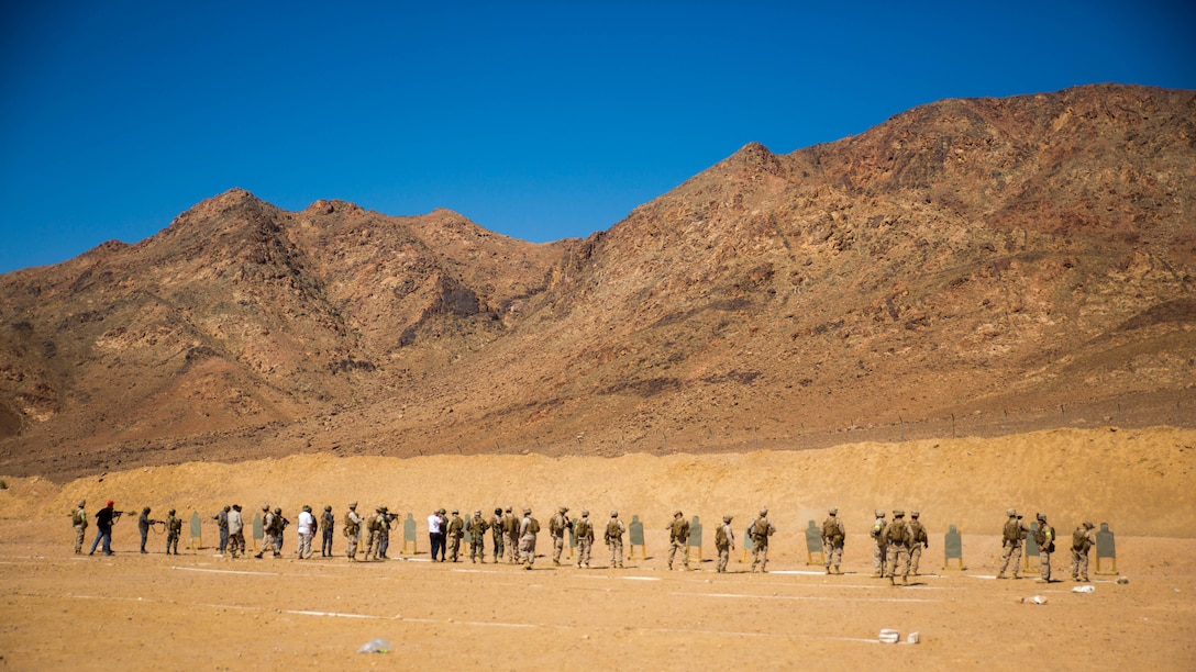 United States Marines from Easy Company, 2nd Battalion, 2nd Marine Regiment partnered with members of the Jordanian Armed Forces to complete a close-quarters marksmanship range May 6, 2015, during exercise Eager Lion 15. Eager Lion is an annual, multinational training exercise designed to build interoperability, promote partnerships and exchange military expertise with 16 partner nations and NATO. Eager Lion 15 takes place in the Hashemite Kingdom of Jordan from May 5-19. 