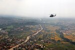 In this photo, a UH-1Y Venom, with the Joint Task Force 505, fly’s through a valley in the Sindhuli District, Nepal, May, 10, in order to deliver aid and relief supplies to remote areas of the Dolakha and Sindhuli Districts during Operation Sahayogi Haat. The Nepalese Government requested the U.S. Government’s assistance after a 7.8 magnitude earthquake struck the country, April 25. The U.S. government ordered JTF 505 to provide unique capabilities to assist Nepal. 