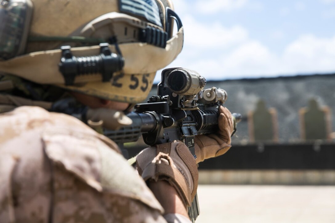 A U.S. Marine with the 15th Marine Expeditionary Unit’s Maritime Raid Force aims in on his target aboard Marine Corps Base Hawaii, May 10, 2015. The MRF is maintaining their proficiency by training in Hawaii. They will join the rest of the 15th MEU and continue their deployment in the western Pacific and Middle East later this month. (U.S. Marine Corps photo by Cpl. Anna Albrecht/ Released)