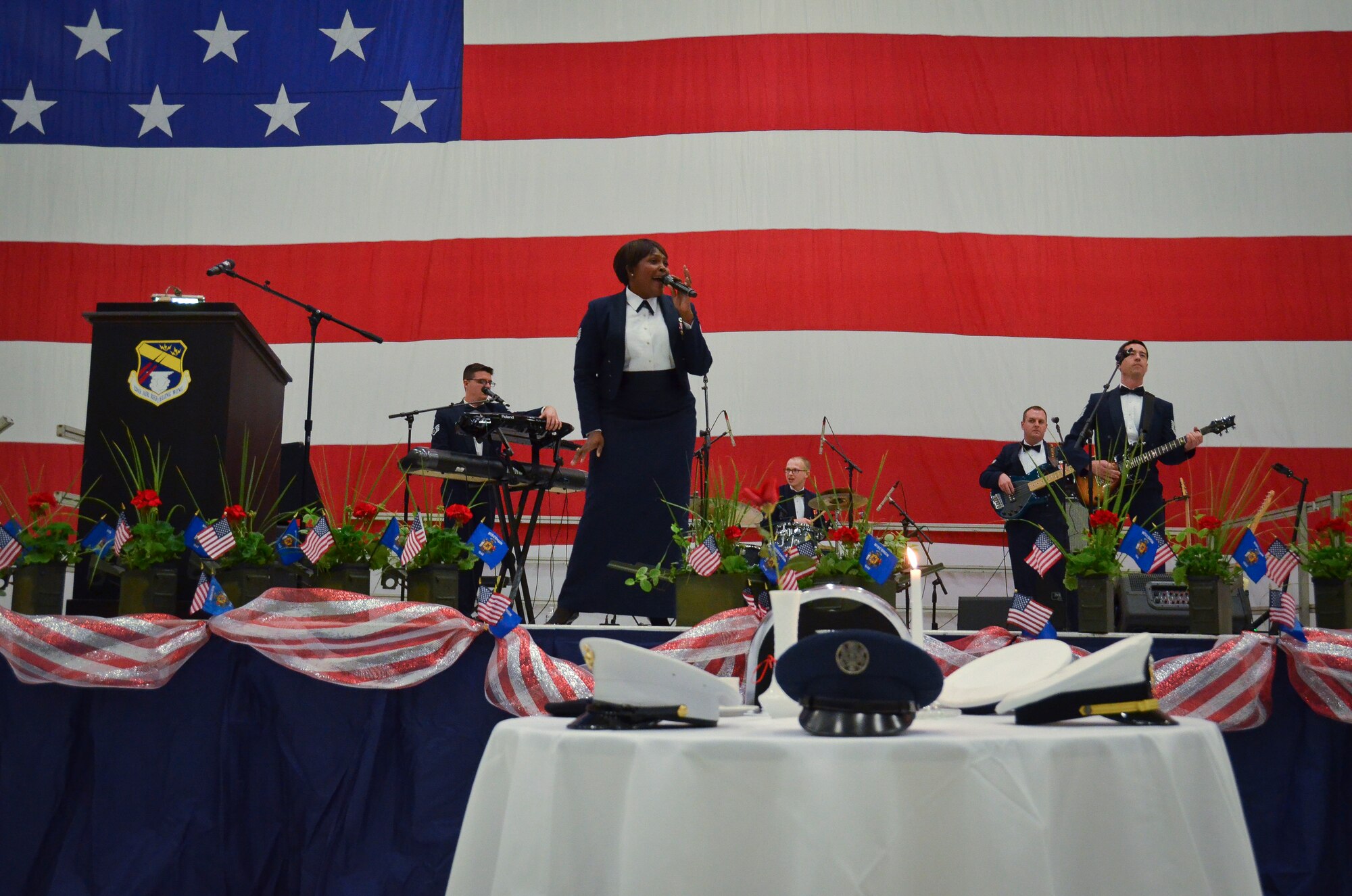 U.S. Air Force Band of Mid-America, Starlifter, based out of Scott Air Force Base, Ill. performs at the 35th annual Civic Dinner Dance in the aircraft hangar here May 14, 2015.  The Civic Dinner Dance is an event coordinated by the Milwaukee Armed Forces Committee for Wisconsin military members, elected state and local officials, and citizens of the local Milwaukee area to celebrate community relations during Armed Forces Week.  (U.S. Air National Guard photo by Tech. Sgt. Jenna Lenski/Released)