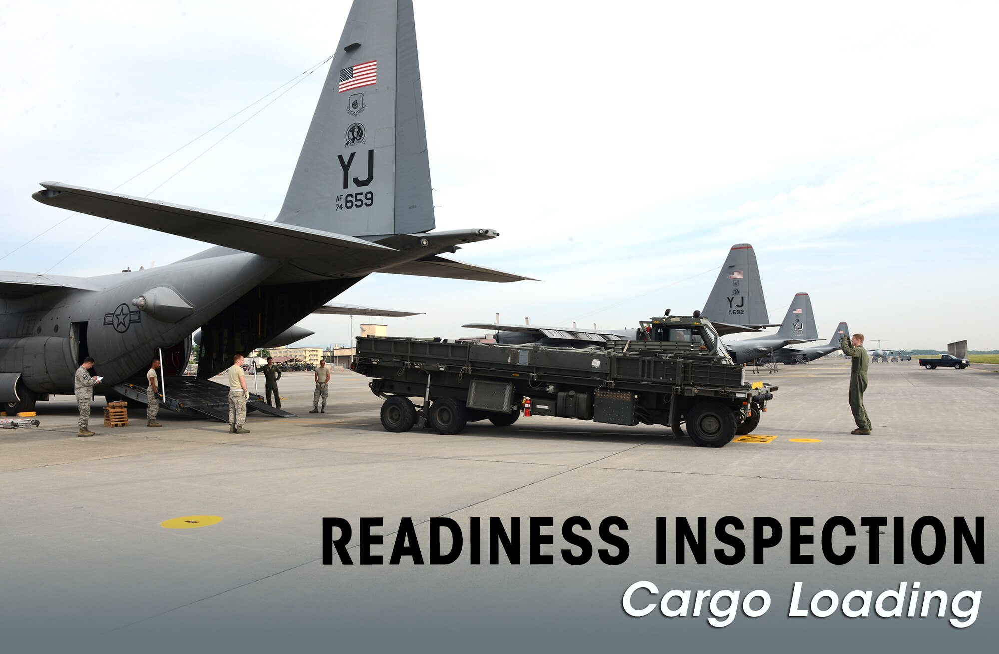Airmen from the 374th Airlift Wing load a K-loader on a C-130 Hercules during a readiness inspection May 14, 2015, at Yokota Air Base, Japan. The inspection tested Yokota’s ability to receive and deploy forces and equipment during contingency operations. (U.S. Air Force graphic by Senior Airman Desiree Economides/Released)