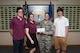 Caleb Barnes, Amara Barnes and Riley Segars, students at Loveless Academic Magnet Program High School, Montgomery, Alabama, present Capt. Amanda McGowin, Air University’s International Officer School, with a donation of $235 for the IOS International Family Orientation Program. The students held a fundraiser at LAMP to raise money for IFOP, which helps the families of international students attending AU familiarize themselves with the United States. IFOP runs from June 22-30, 2015, and people wanting to volunteer with IFOP can call IOS at 953-7613/6338. (U.S. Air Force photo by Melanie Rodgers Cox/cleared)  