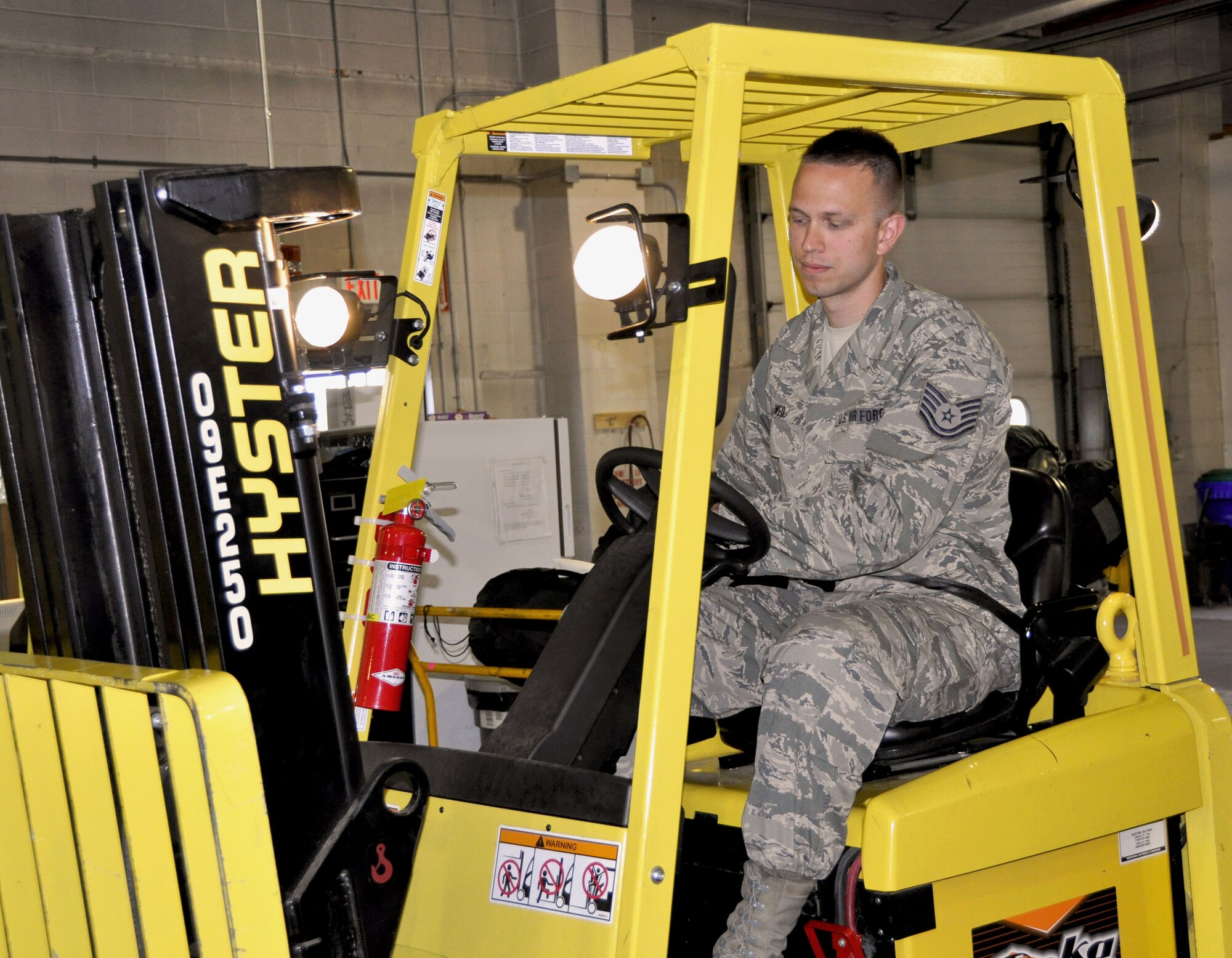 Tech. Sgt. Grayson Weil, material management specialist, 914th Logistics Readiness Squadron operates a forklift at Niagara Falls Air Reserve Station on May 3, 2015. Weil has been stationed at NFARS for more than 10 years. (U.S. photo by Staff Sgt. Richard Mekkri) 