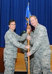 Maj. Gen. Theresa C. Carter, Air Force Installation and Mission Support Center commander, passes the guidon to Col. Brian Murphy as he assumes command of AFIMSC Detachment 7 May 6 at Joint Base San Antonio-Randolph, Texas.  Detachment 7 combines and oversees functions in the security forces, civil engineer, base communications, logistics readiness, installation ministry programs, services, operational contracting and financial management fields. The mission of the detachment is to synchronize and execute installation and mission support for commanders from Air Education and Training Command.  AFIMSC serves as a single intermediate-level headquarters for the delivery of installation support capabilities throughout the Air Force and reports to Air Force Materiel Command.  (U.S. Air Force photo by Melissa Peterson)