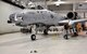 Master Sgt. Christopher Barton, lead dedicated crew chief to aircraft 79-123 at the 442d Fighter Wing at Whiteman Air Force Base, Missouri, removes a ladder from the plane. Barton's aircraft, which was also honored with the wing's 