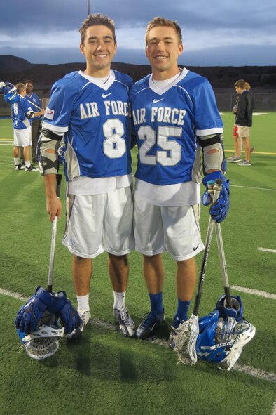 U.S. Air Force Academy Falcons Cadets Eric (right) and Austin Smith pose for a photo after a game last year. Erik Smith, who is now a second lieutenant program manager for the C3I and Networks Directorate at Hanscom, was drafted 37th overall by the Boston Cannons in the Major League Lacrosse draft in 2014, (Courtesy photo)